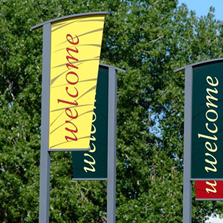 Welcome Flag Yellow flag with Welcome printed on it.
